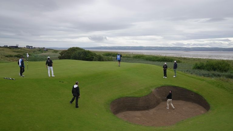 Spain's Jose Luis Ballester Barrio (amateur), play out of a...