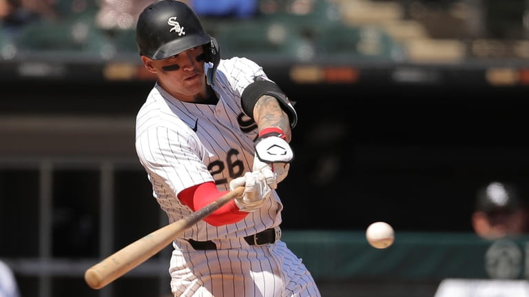 Chicago White Sox's Korey Lee hits an RBI single during...