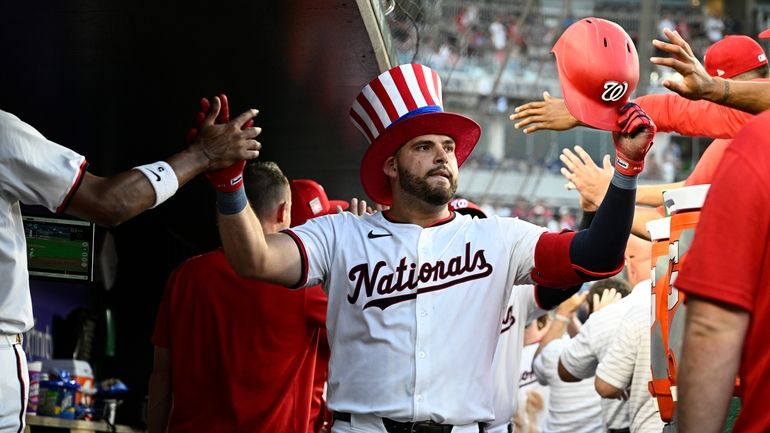 Washington Nationals' Juan Yepez celebrates his three-run home run with...