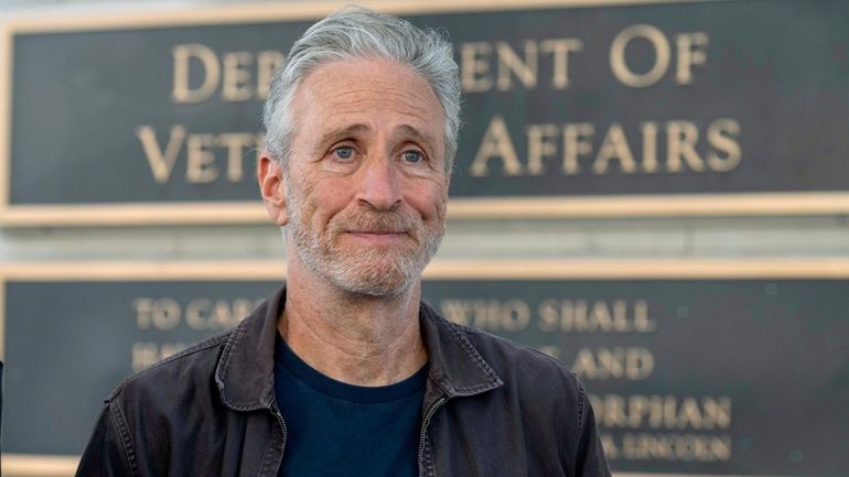 Jon Stewart takes part in an interview outside the Department...