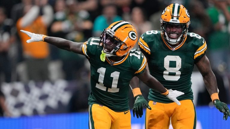 Green Bay Packers wide receiver Jayden Reed (11) celebrates after...