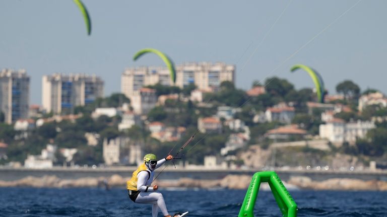 Valentin Bontus of Austria celebrates after the men's kite semifinal...