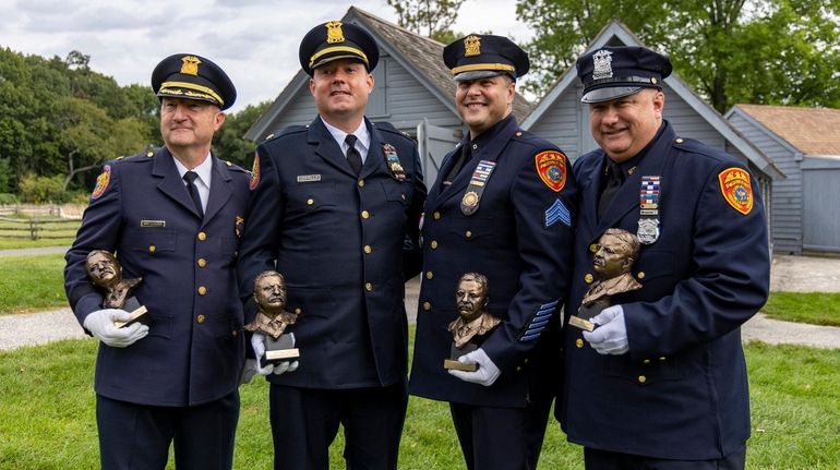 Nassau County police Deputy Chief James Bartscherer, left, Nassau Deputy...