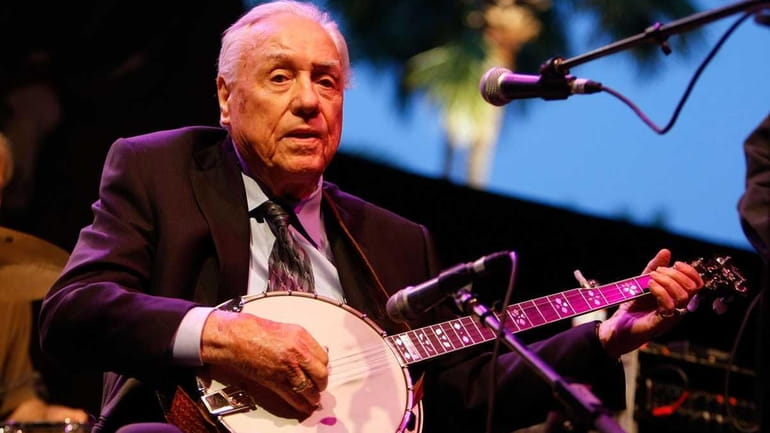 Musician Earl Scruggs performs onstage in Indio, Calif. (April 25,...