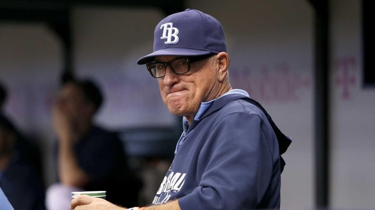 Tampa Bay Rays manager Joe Maddon looks on from the...