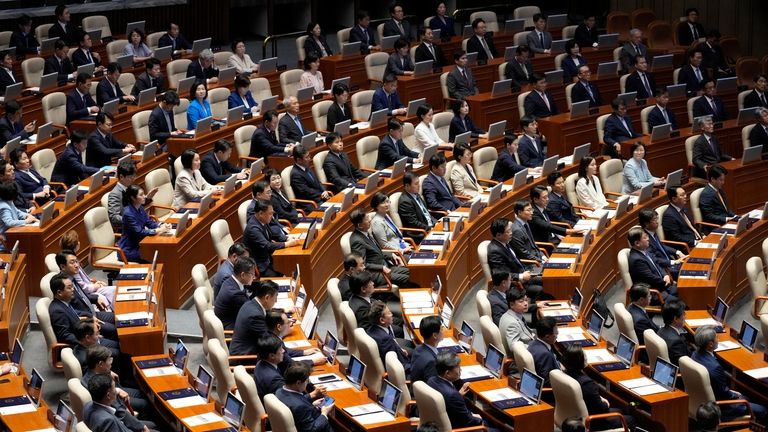 South Korean lawmakers attend during the opening ceremony of the...