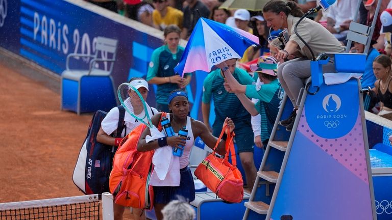 Coco Gauff and Jessica Pegula of the United States leave...