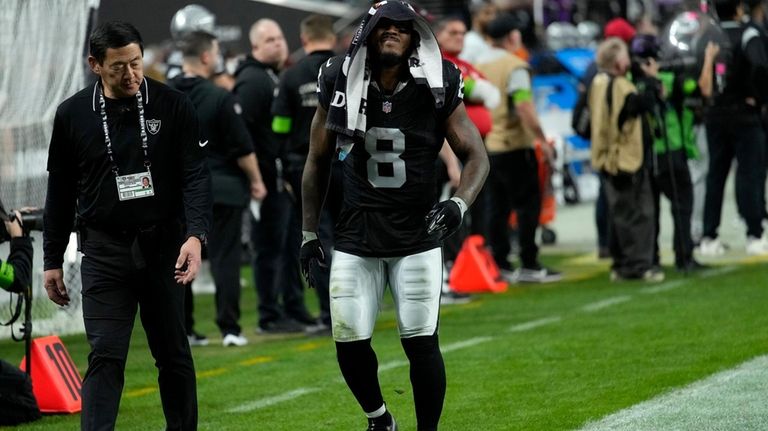 Las Vegas Raiders running back Josh Jacobs (8) leaves the...