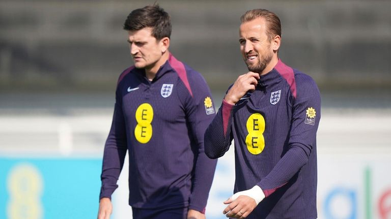 England's Harry Kane and Harry Maguire during a training session...