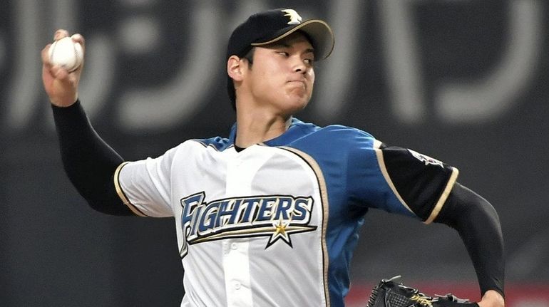 Hokkaido Nippon Ham's Shohei Ohtani pitches against Orix Buffaloes in...