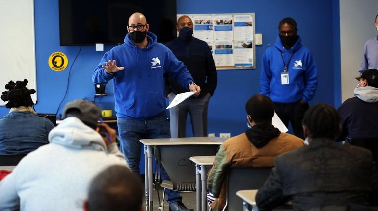 Employment counselor Lee Basile helps facilitate an employment workshop at...