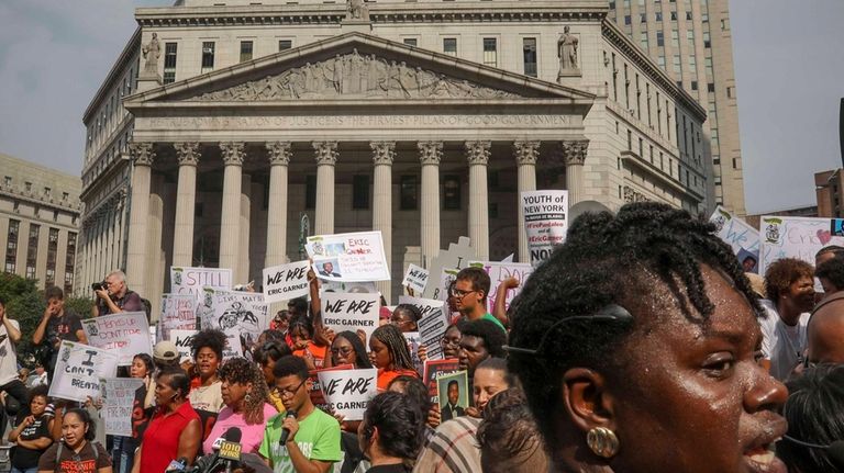 A rally of mostly young people protest in Federal Plaza,...