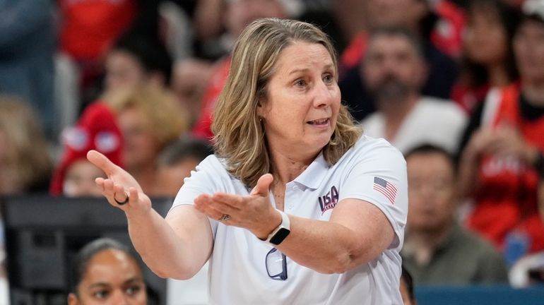 Unites States head coach Cheryl Reeve gestures in a women's...