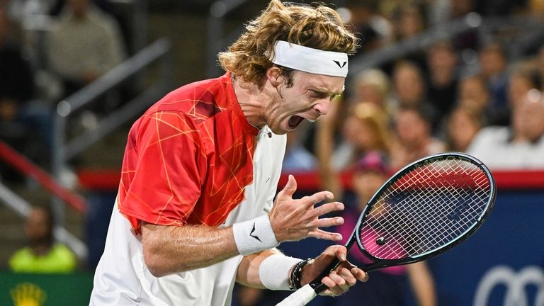 Andrey Rublev, of Russia, reacts after a shot to Alexei...