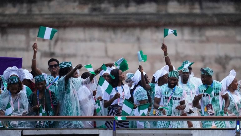 The boat carrying team Nigeria makes its way down the...