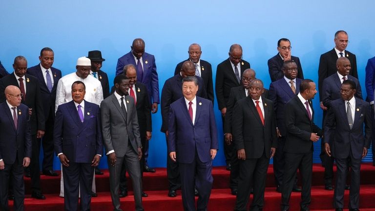 China's President Xi Jinping, center, and leaders from African countries...