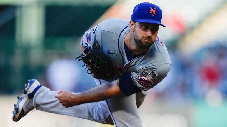 Mets starting pitcher David Peterson throws during the first inning...