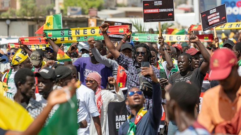 Supporters of the Aar Sunu Senegal opposition collective demonstrate on...