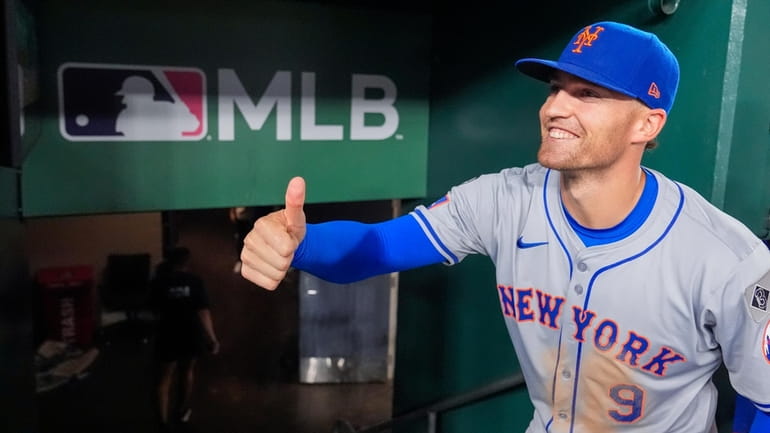 The Mets' Brandon Nimmo poses for a photo for a...