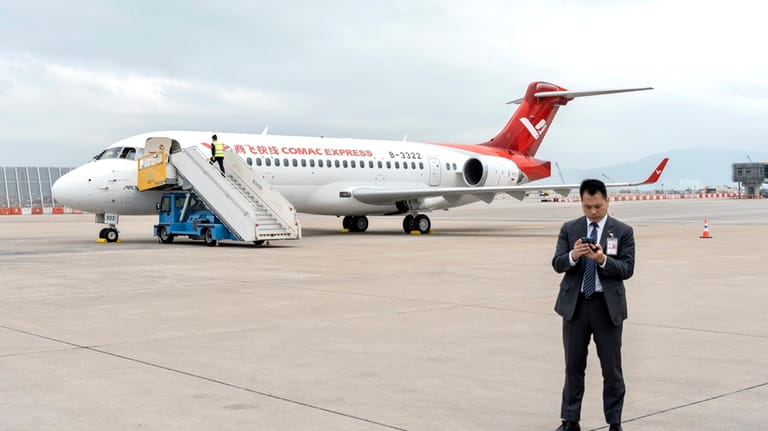 The Chinese-made ARJ21 is displayed at the Hong Kong International...