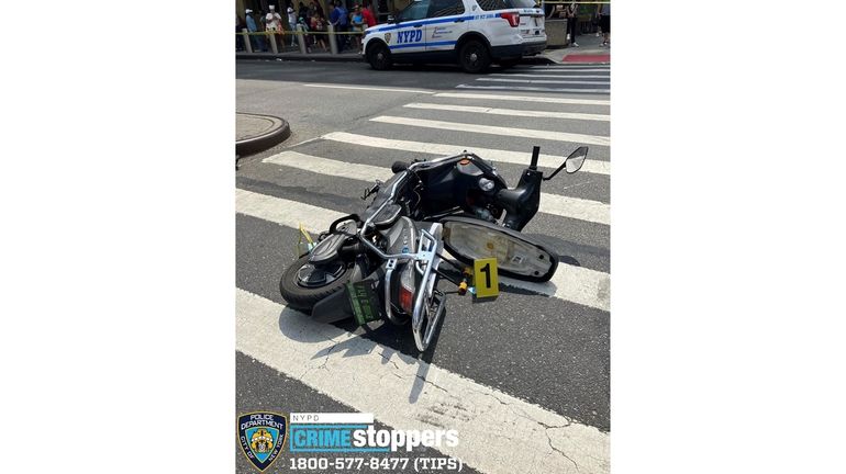 A photo provided by the NYPD shows a motor scooter...