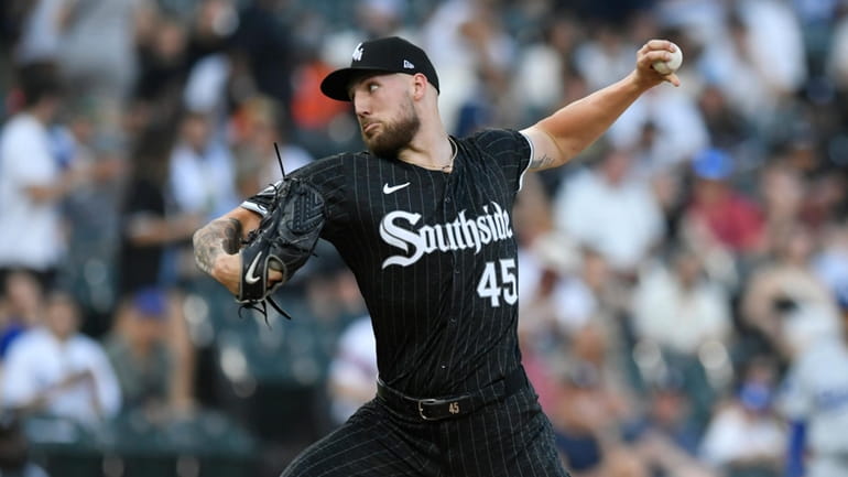 Chicago White Sox starter Garrett Crochet delivers a pitch during...