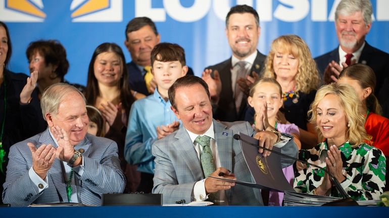 Louisiana Gov. Jeff Landry signs bills June 19, 2024, at...