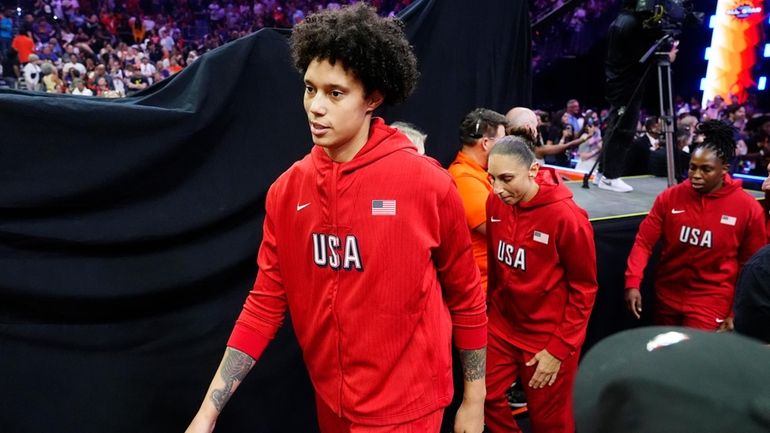 Brittney Griner, left, Diana Taurasi, and Chelsea Gray, of Team...