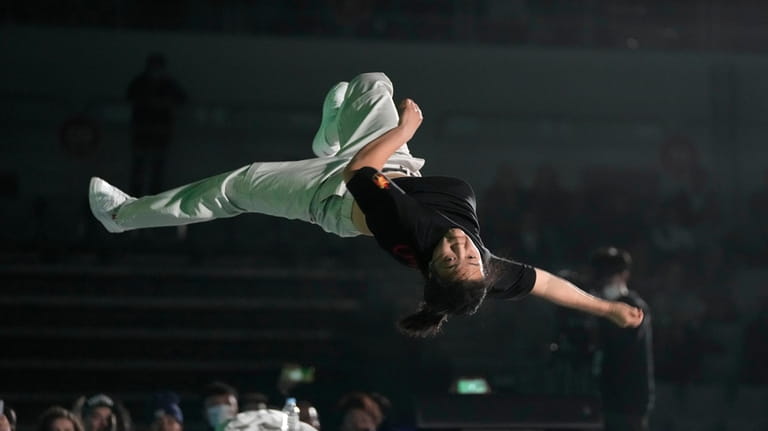 Liu Qingyi of China, known as B-girl 671, competes against...