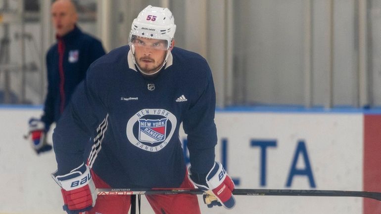 The Rangers' Ryan Lindgren looks on at training camp on...