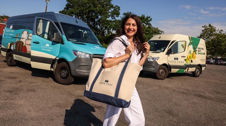 Danielle Candela, owner of Tote Taxi and Tote Camps, with her...