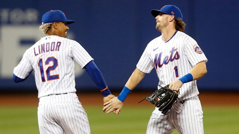 Mets infielders Francisco Lindor, left, and Jeff McNeil.