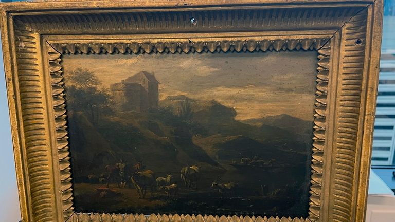 This photo shows the 18th century painting titled "Landscape of...