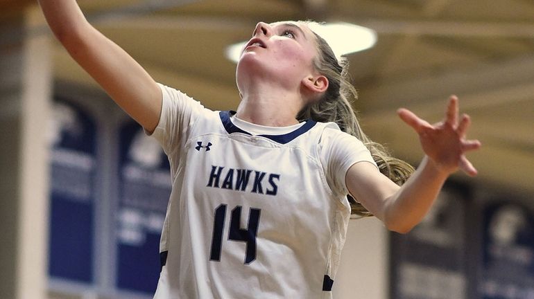 Emma Heaney of Plainview-Old Bethpage JFK drives to the net...