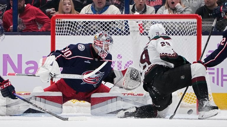 Arizona Coyotes center Barrett Hayton (29) scores on Columbus Blue...