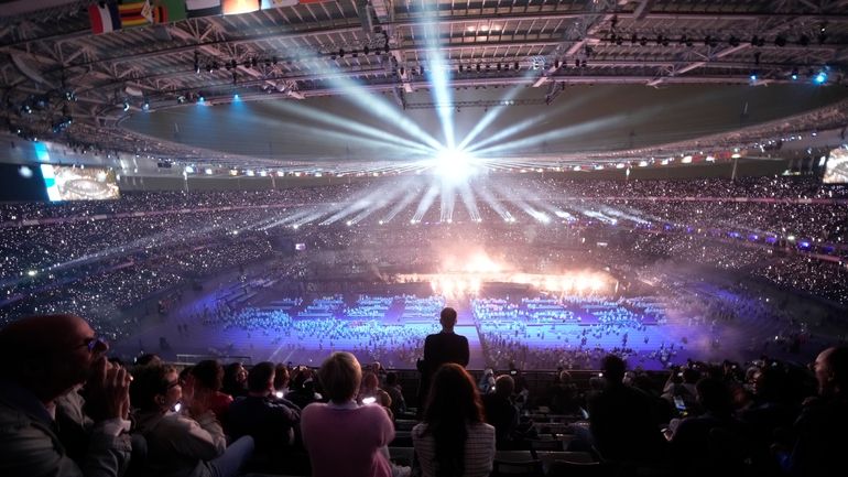 Spectators attend the closing ceremony of the 2024 Paralympics under...