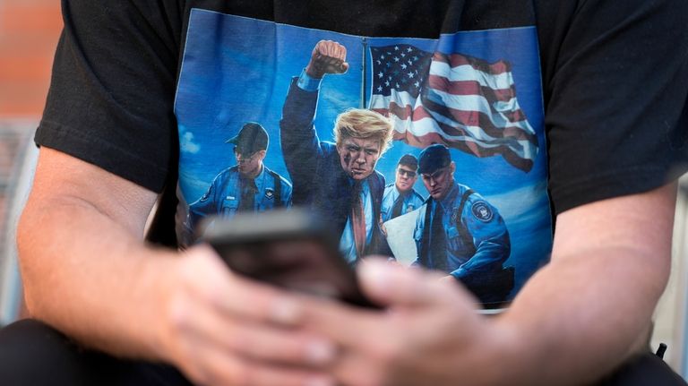 Joseph Wiederien wears a Republican presidential nominee former President Donald...