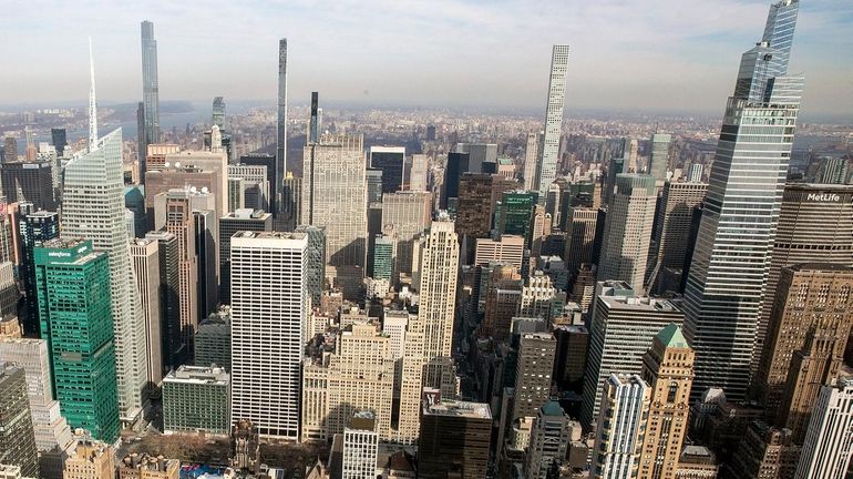 The Manhattan skyline is seen from the observatory of the...