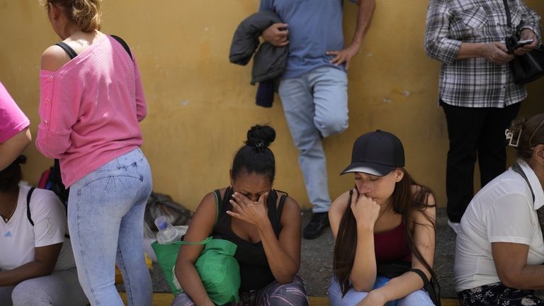 The families of detainees gather outside the Zone 7 National...