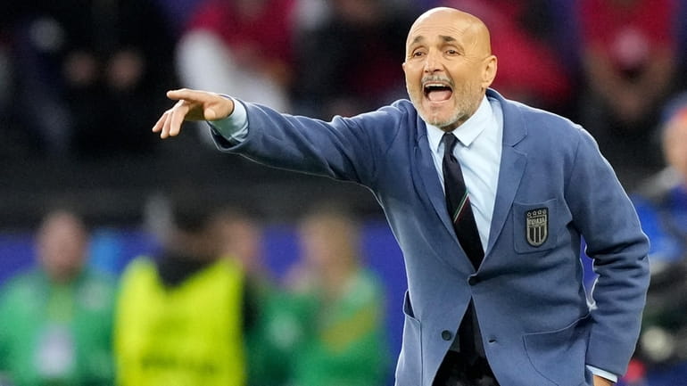 Italy's head coach Luciano Spalletti gestures from the touchline during...