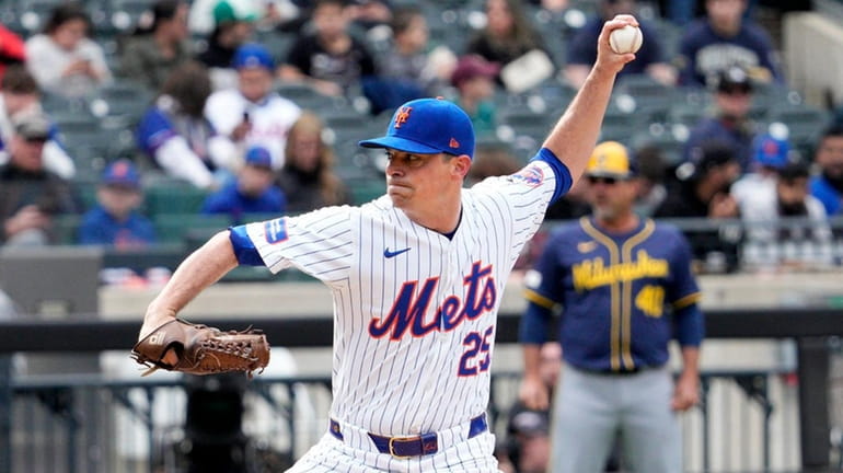Brooks Raley of the Mets throws against the Milwaukee Brewers at...