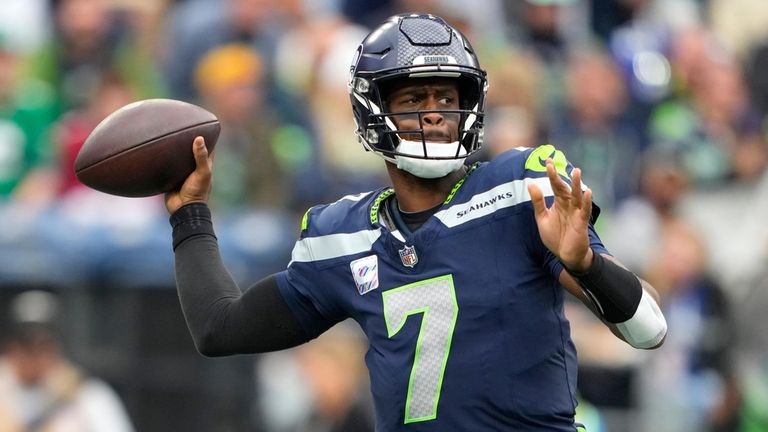 Seattle Seahawks quarterback Geno Smith throws a pass against the...