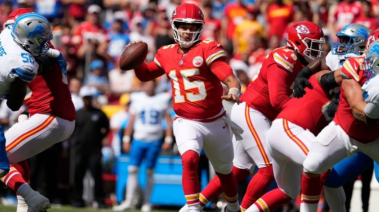 Kansas City Chiefs quarterback Patrick Mahomes (15) looks to pass...