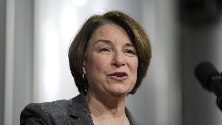 U.S. Sen. Amy Klobuchar, D-Minn., speaks before President Joe Biden...