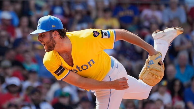 Boston Red Sox starting pitcher Kutter Crawford throws against the...