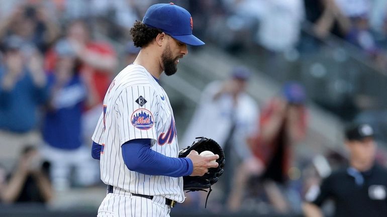 Jorge Lopez #52 of the New York Mets looks on...