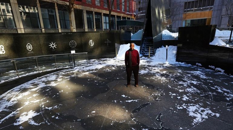 David Mills stands in the Ancestral Libation Court at the...