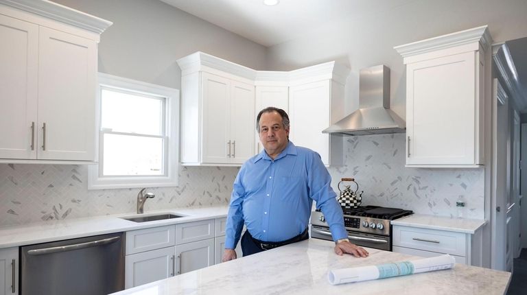 Architect Michael J. Palomba in the kitchen addition that he recently designed for...