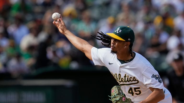 Oakland Athletics pitcher Osvaldo Bido throws to a San Francisco...