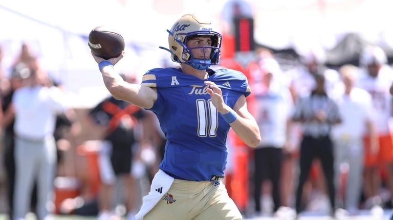 Tulsa quarterback Kirk Francis (11) throws a pass against Oklahoma...